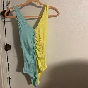 Peach Love blue and yellow body suit, size small